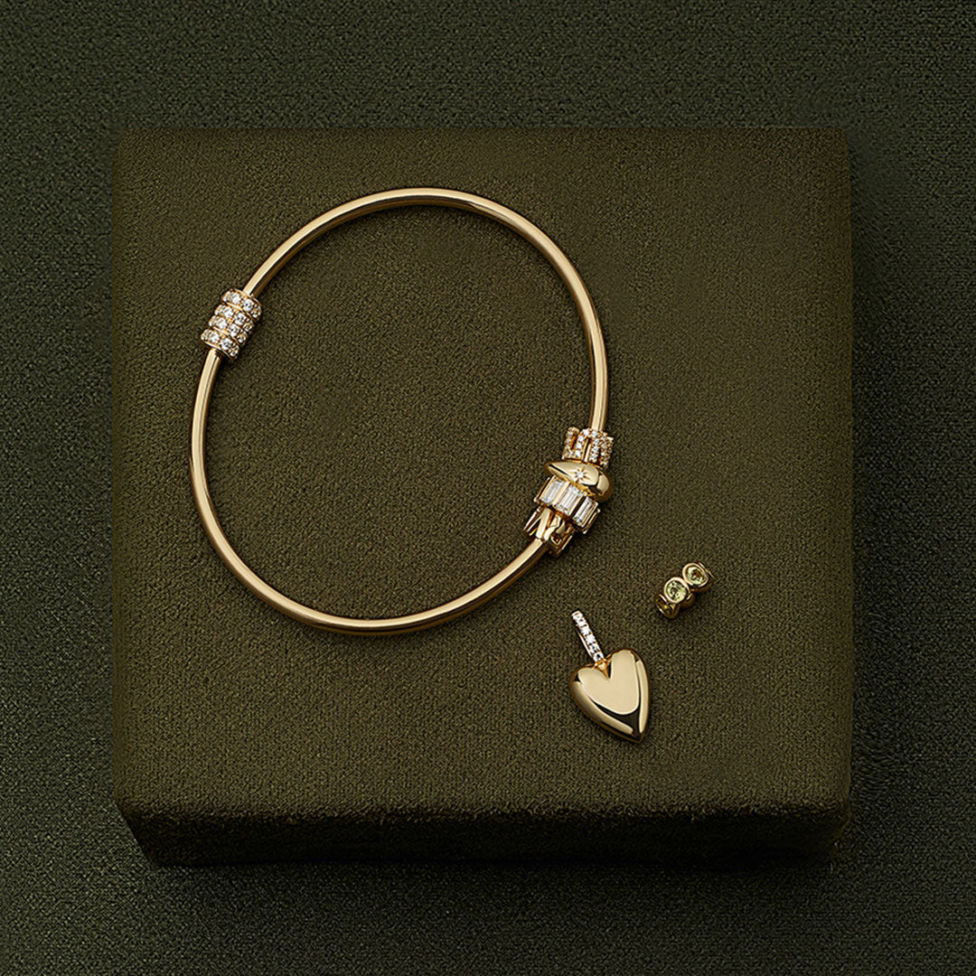 Pulsera bangle rígida de oro 14K con diamantes de Emiliana
